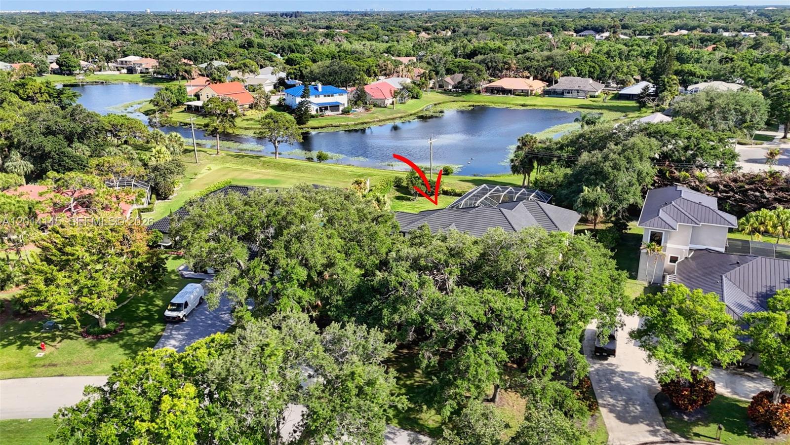 19558 Red Gum Trail Jupiter, FL 33458 - Photo 67 of 81 an aerial view of a houses with a lake view