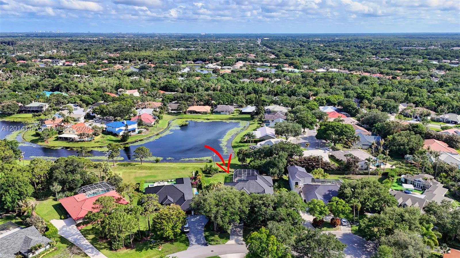 19558 Red Gum Trail Jupiter, FL 33458 - Photo 70 of 81 an aerial view of a houses and an outdoor space