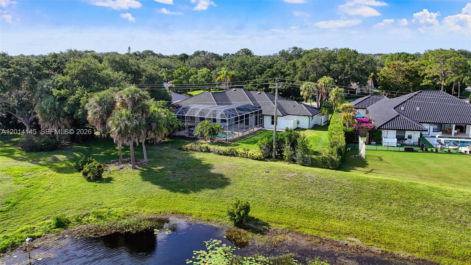 19558 Red Gum Trail Jupiter, FL 33458 - Photo 78 of 81 a view of house with garden space and street view