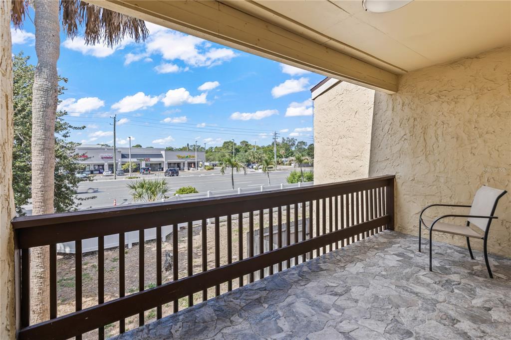 3405 Clark Road, Unit 205 Sarasota, FL 34231 - Photo 19 of 28 a city view from a balcony