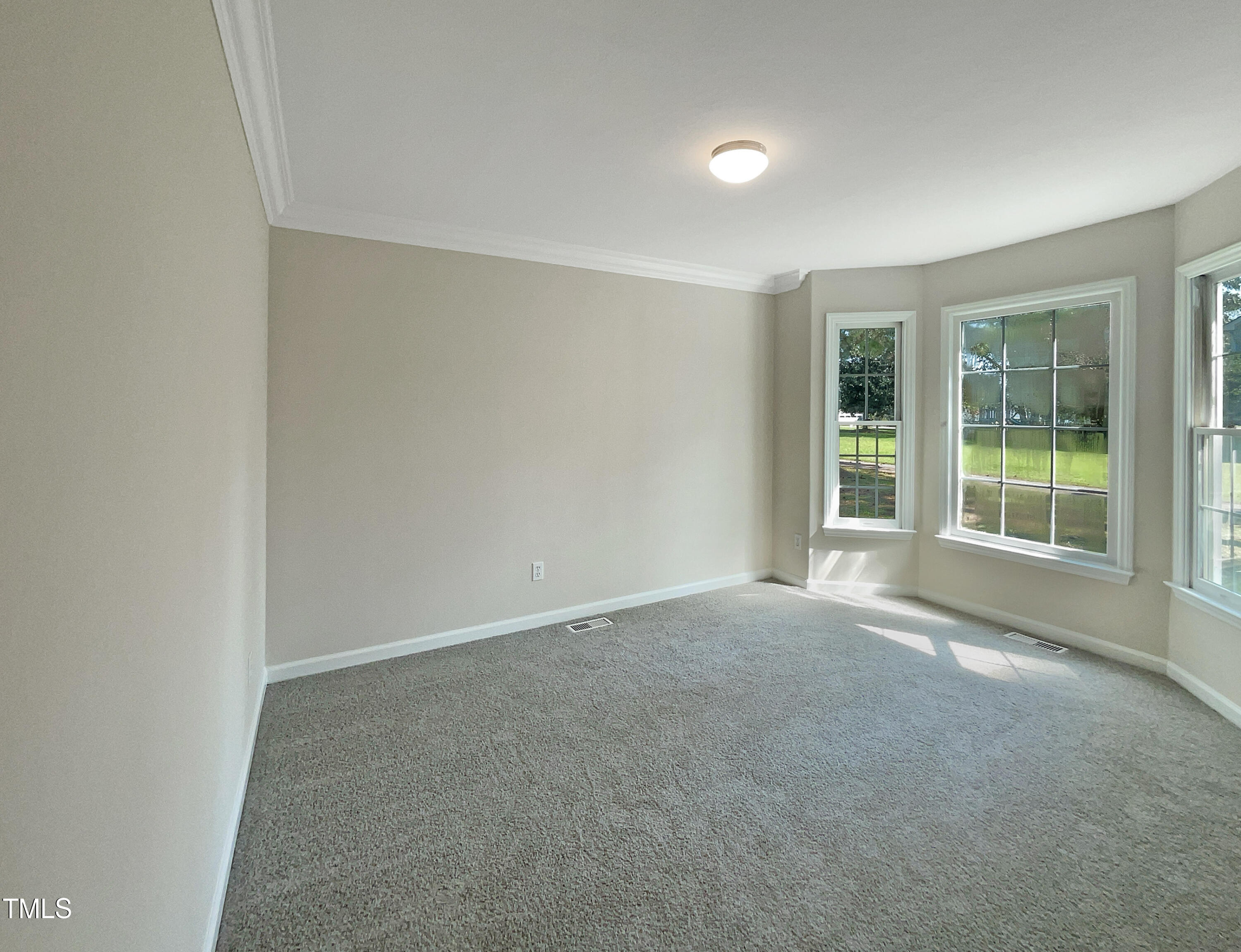 27 Pine Croft Road Angier, NC 27501 - Photo 10 of 19 an empty room with windows