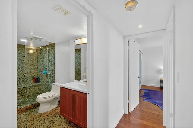 a living room with a couch and a fireplace