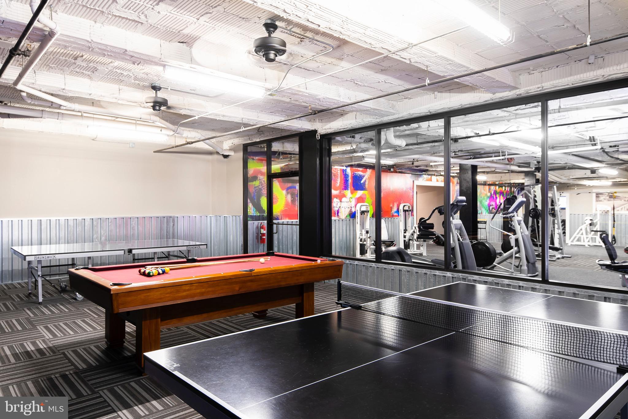 301 North Charles Street, Unit 2BR Baltimore, MD 21202 - Photo 23 of 48 a room with stainless steel appliances and chandelier