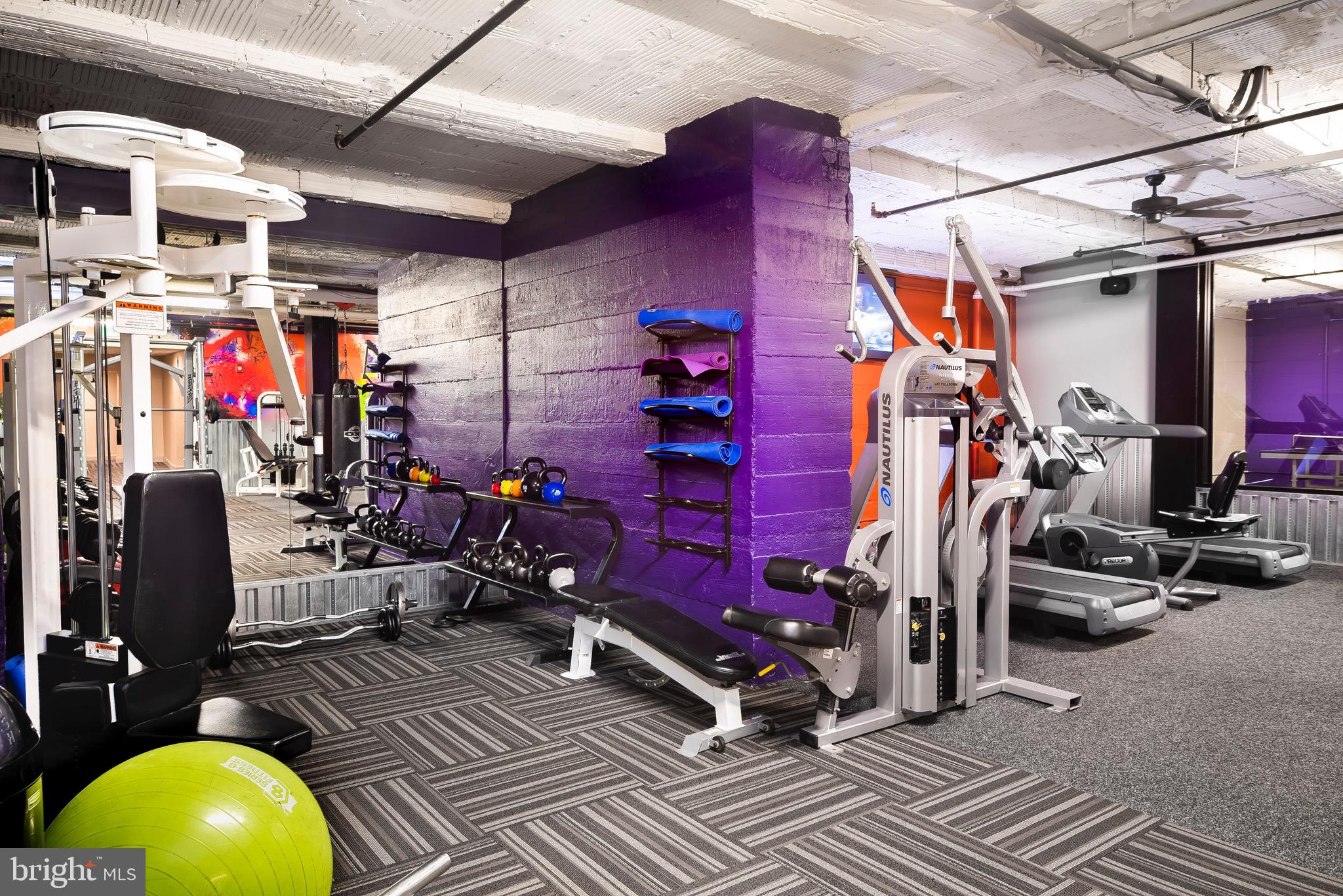 301 North Charles Street, Unit 2BR Baltimore, MD 21202 - Photo 26 of 48 a view of a room with gym equipment
