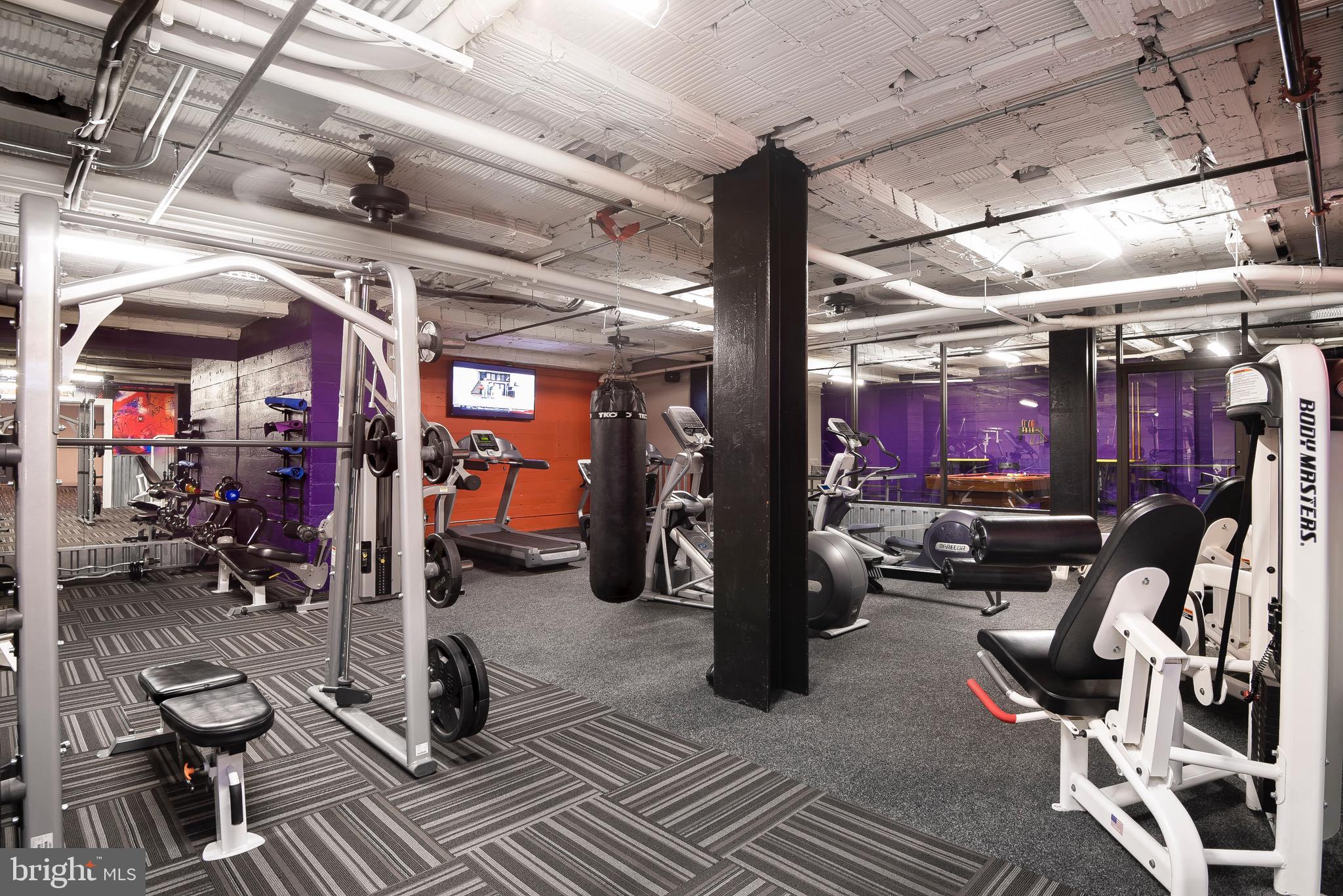 301 North Charles Street, Unit 2BR Baltimore, MD 21202 - Photo 27 of 48 a view of a room with gym equipment