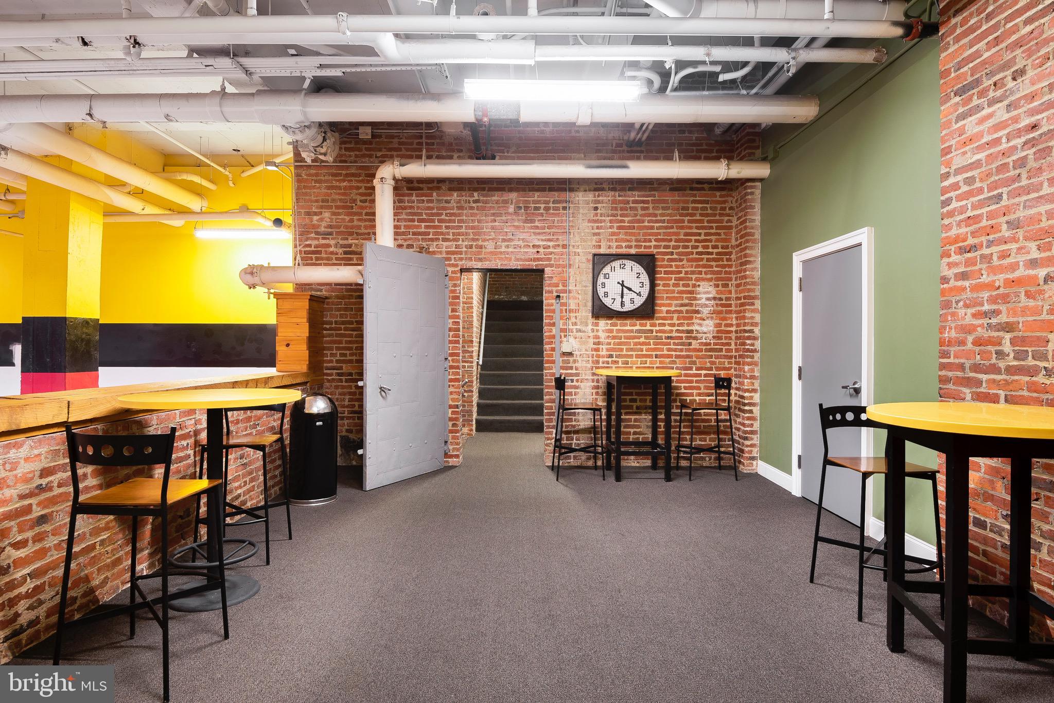 301 North Charles Street, Unit 2BR Baltimore, MD 21202 - Photo 30 of 48 a view of livingroom with furniture and window
