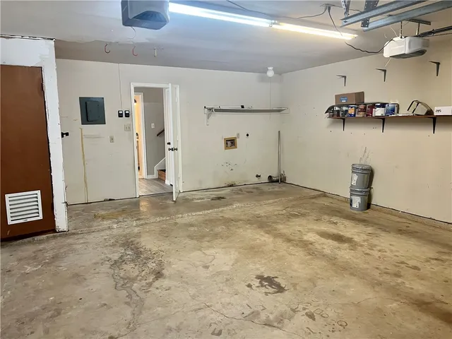 a view of a storage & utility room with a sink