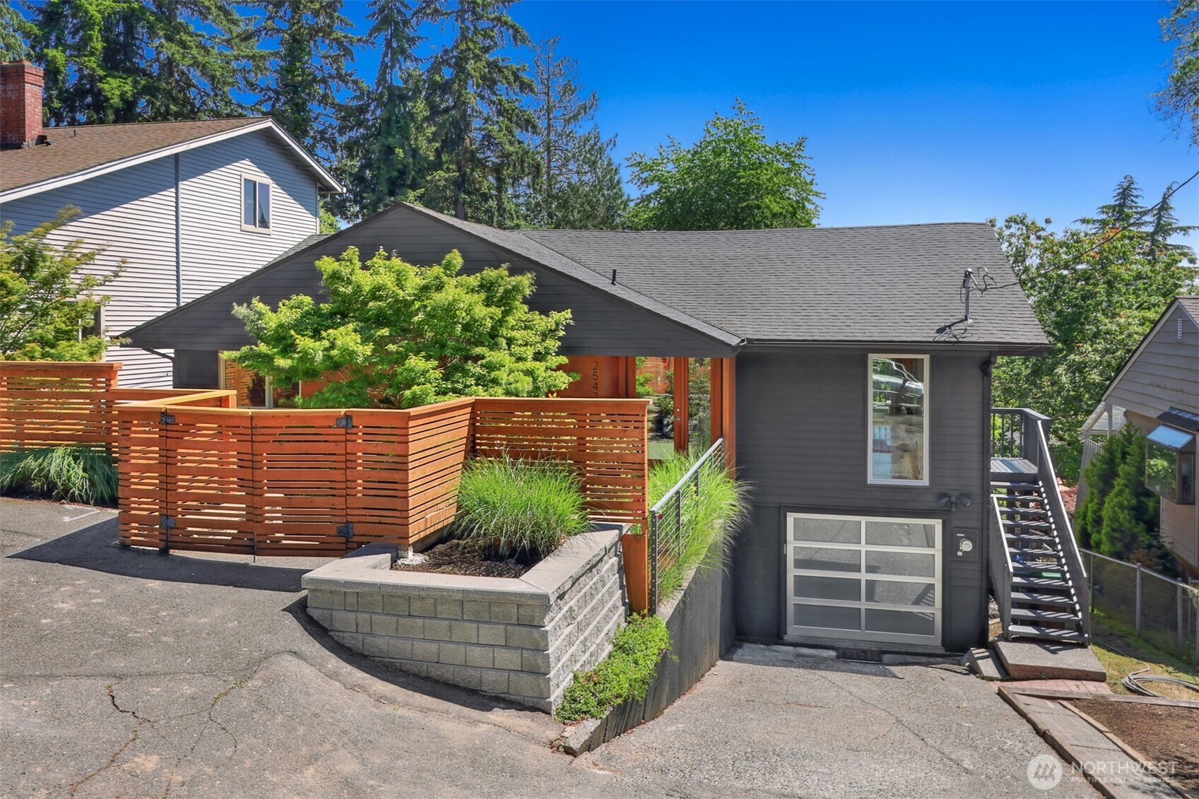 2547 Northeast 83rd Street Seattle, WA 98115 - Photo 2 of 38 a house view with a outdoor space