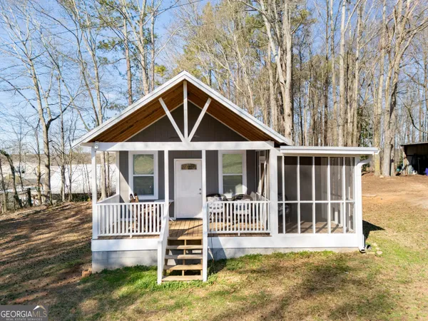 front view of a house with a yard
