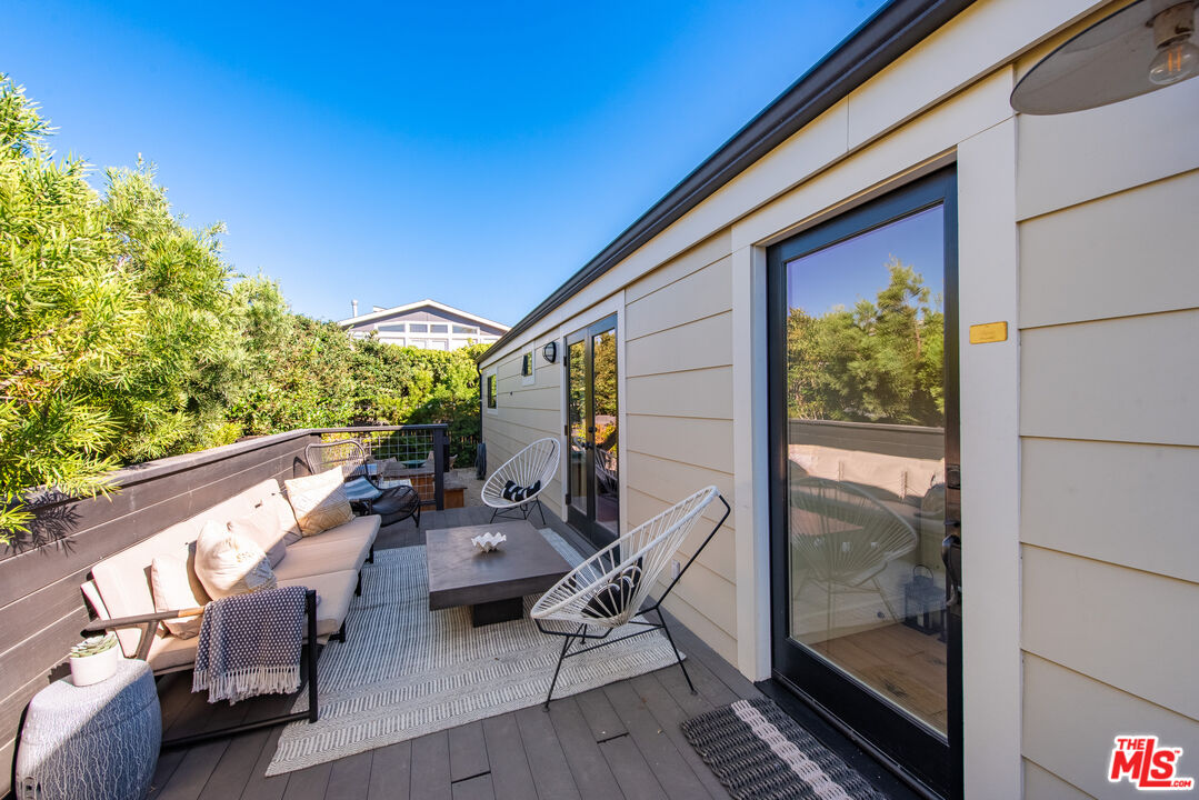 29500 Heathercliff Road, Unit 14 Malibu, CA 90265 - Photo 3 of 28 a view of deck with patio