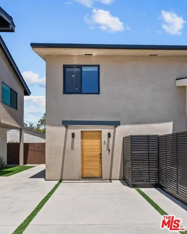 a front view of a house with a garage