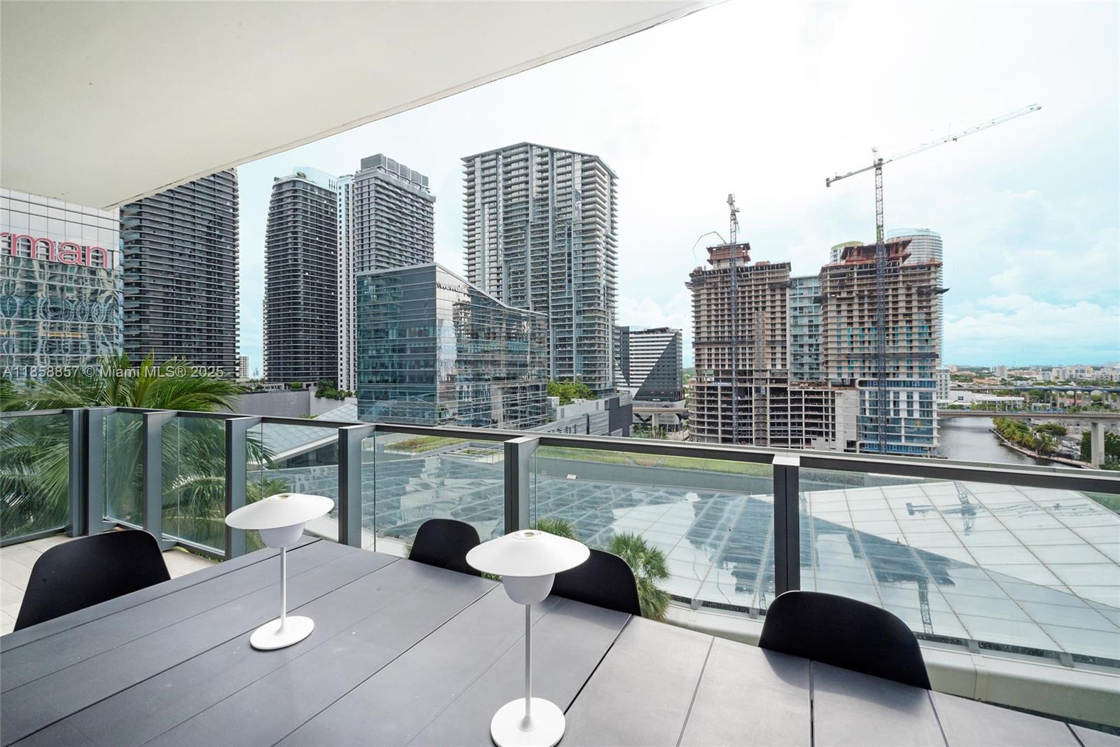68 Southeast 6th Street, Unit 1008 Miami, FL 33131 - Photo 20 of 37 a view of balcony with couch