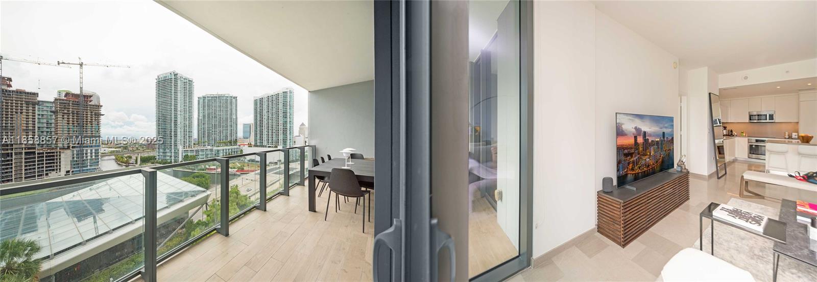 68 Southeast 6th Street, Unit 1008 Miami, FL 33131 - Photo 22 of 37 a view of a balcony