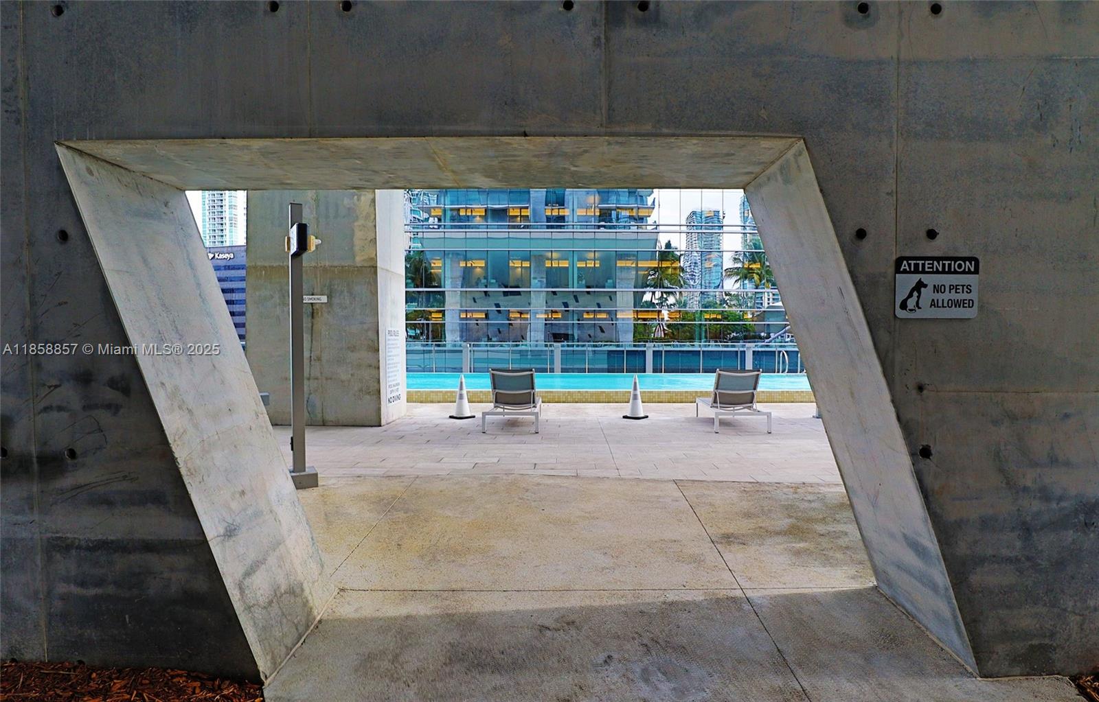 68 Southeast 6th Street, Unit 1008 Miami, FL 33131 - Photo 31 of 37 a view of entryway with a rug