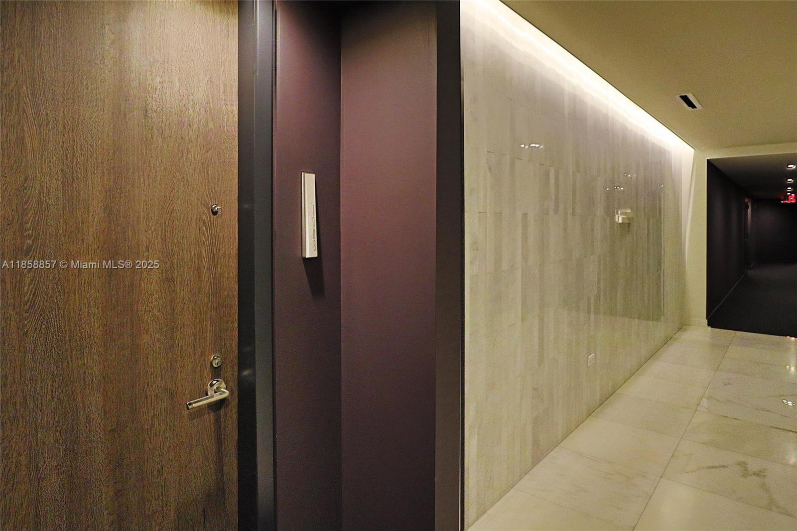 68 Southeast 6th Street, Unit 1008 Miami, FL 33131 - Photo 35 of 37 a bathroom with a shower