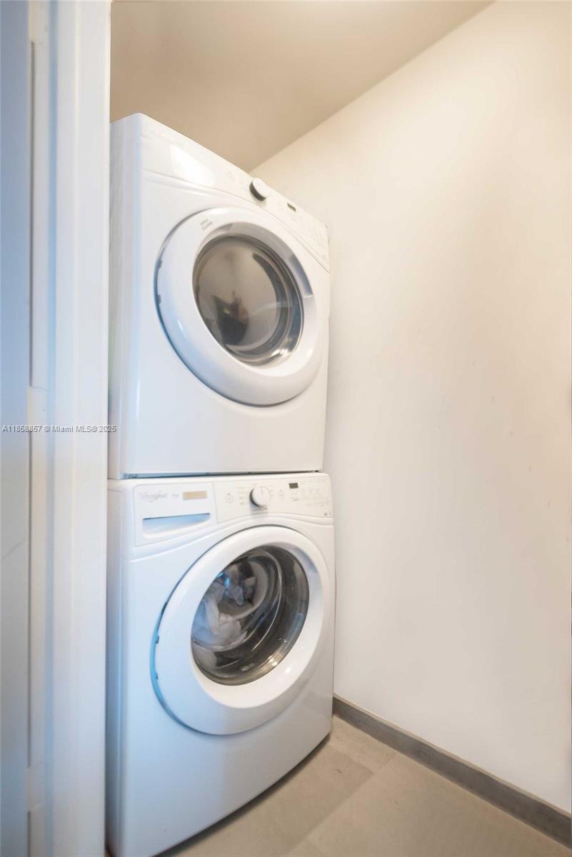68 Southeast 6th Street, Unit 1008 Miami, FL 33131 - Photo 37 of 37 a utility room with dryer and washer