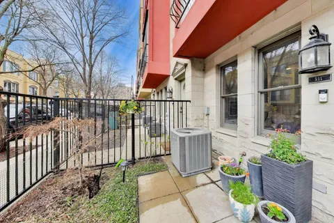 a view of a deck with furniture