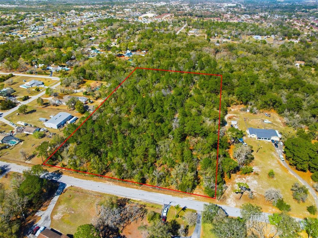 9255 Grouse Way Hudson, FL 34669 - Photo 1 of 17 a view of a yard