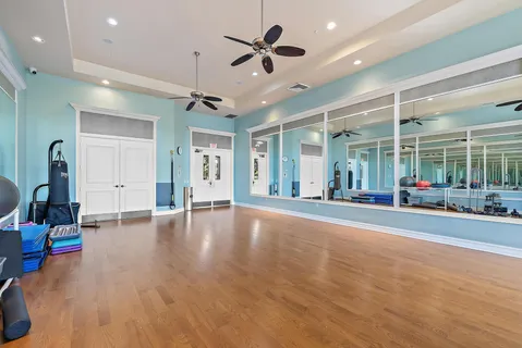 a view of a house with porch and a garden
