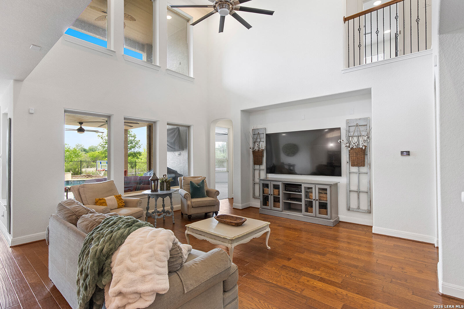 8039 Cibolo Valley Fair Oaks Ranch, TX 78015 - Photo 14 of 63 a living room with furniture and a flat screen tv