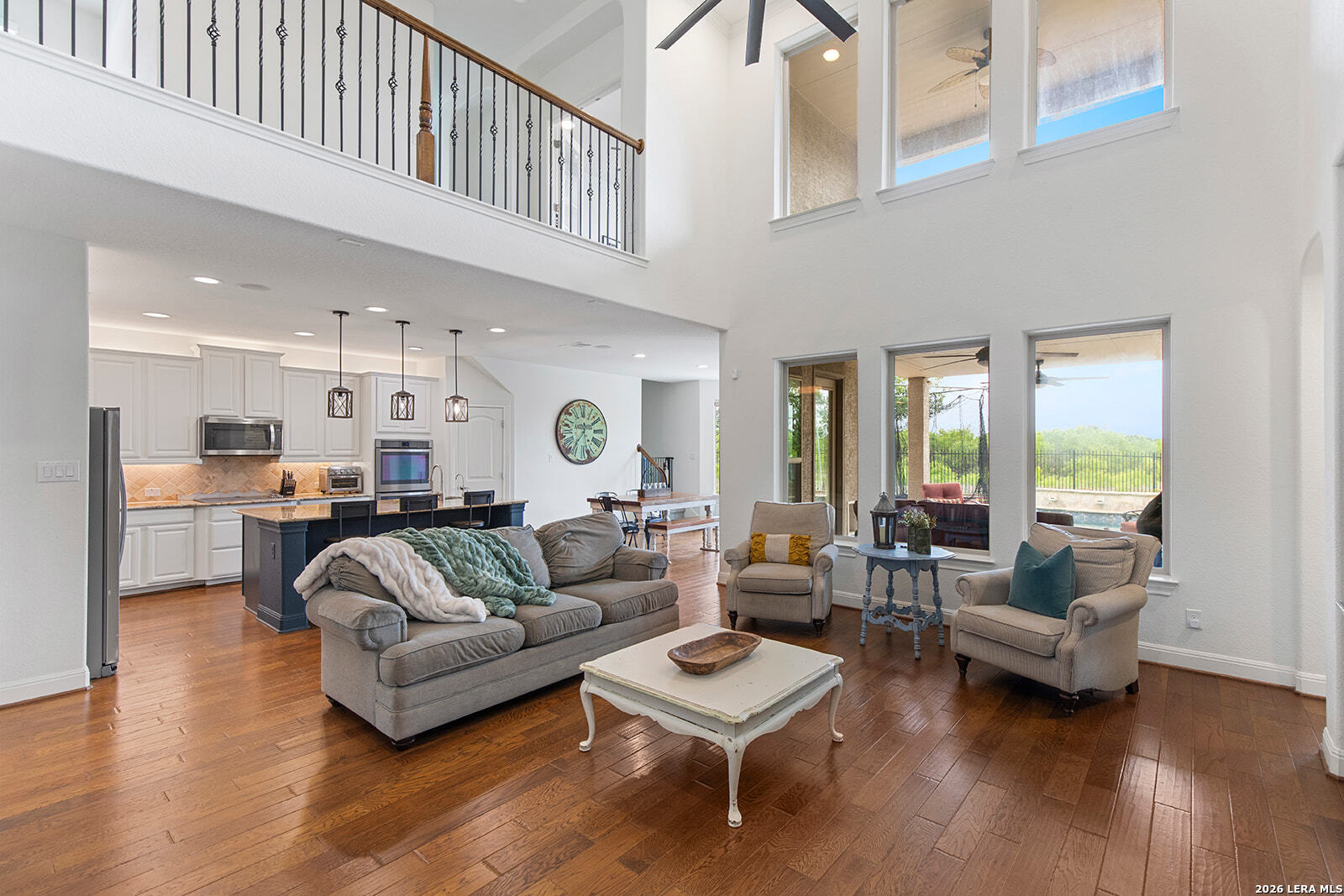 8039 Cibolo Valley Fair Oaks Ranch, TX 78015 - Photo 15 of 63 a living room with furniture and a large window