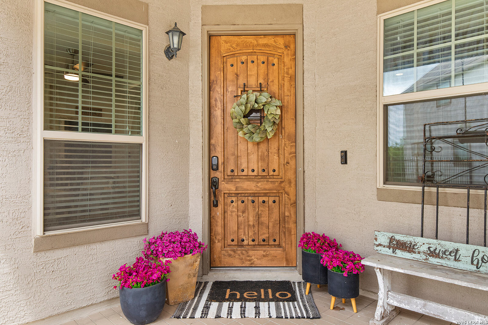 8039 Cibolo Valley Fair Oaks Ranch, TX 78015 - Photo 2 of 63 a view of a entryway with flower pots