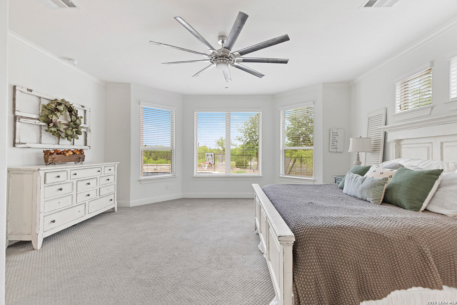 8039 Cibolo Valley Fair Oaks Ranch, TX 78015 - Photo 21 of 63 a bedroom with a large bed and a window