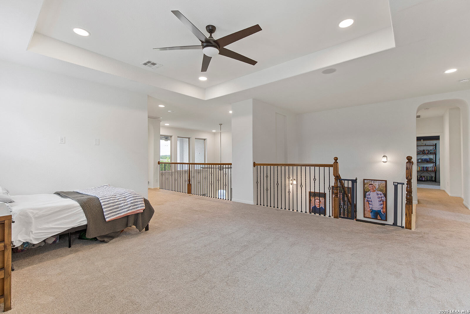 8039 Cibolo Valley Fair Oaks Ranch, TX 78015 - Photo 35 of 63 a living room with furniture and a ceiling fan