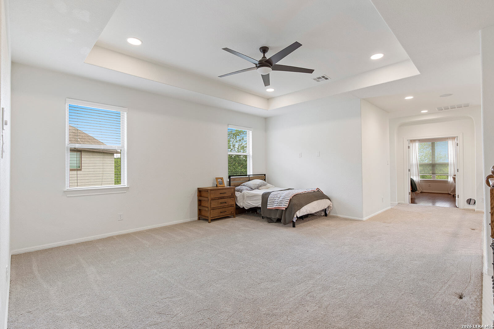 8039 Cibolo Valley Fair Oaks Ranch, TX 78015 - Photo 36 of 63 a living room with furniture and a window