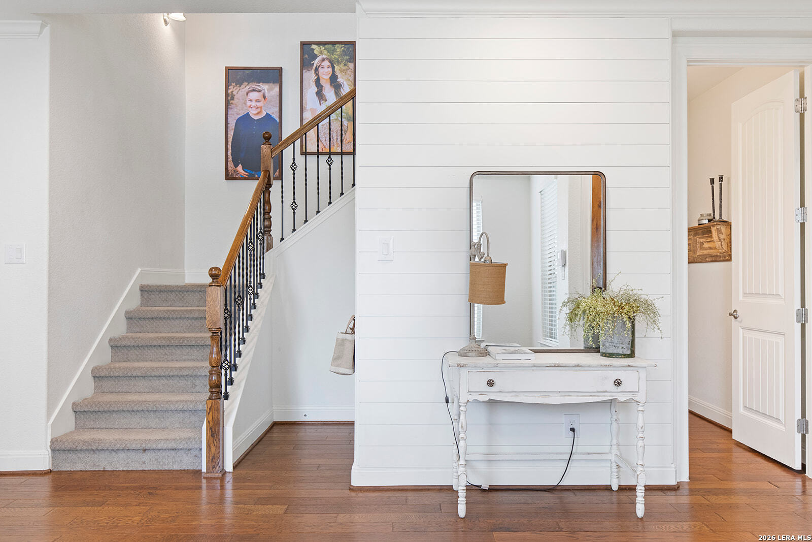 8039 Cibolo Valley Fair Oaks Ranch, TX 78015 - Photo 4 of 63 a view of a hallway with wooden floor and entryway
