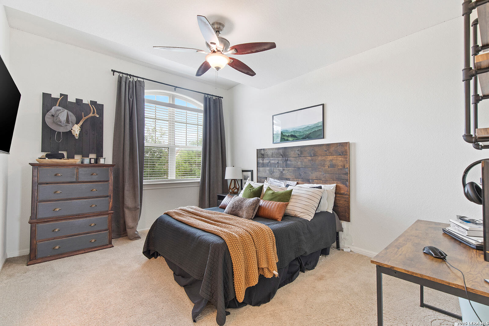 8039 Cibolo Valley Fair Oaks Ranch, TX 78015 - Photo 41 of 63 a bedroom with a large bed and a window