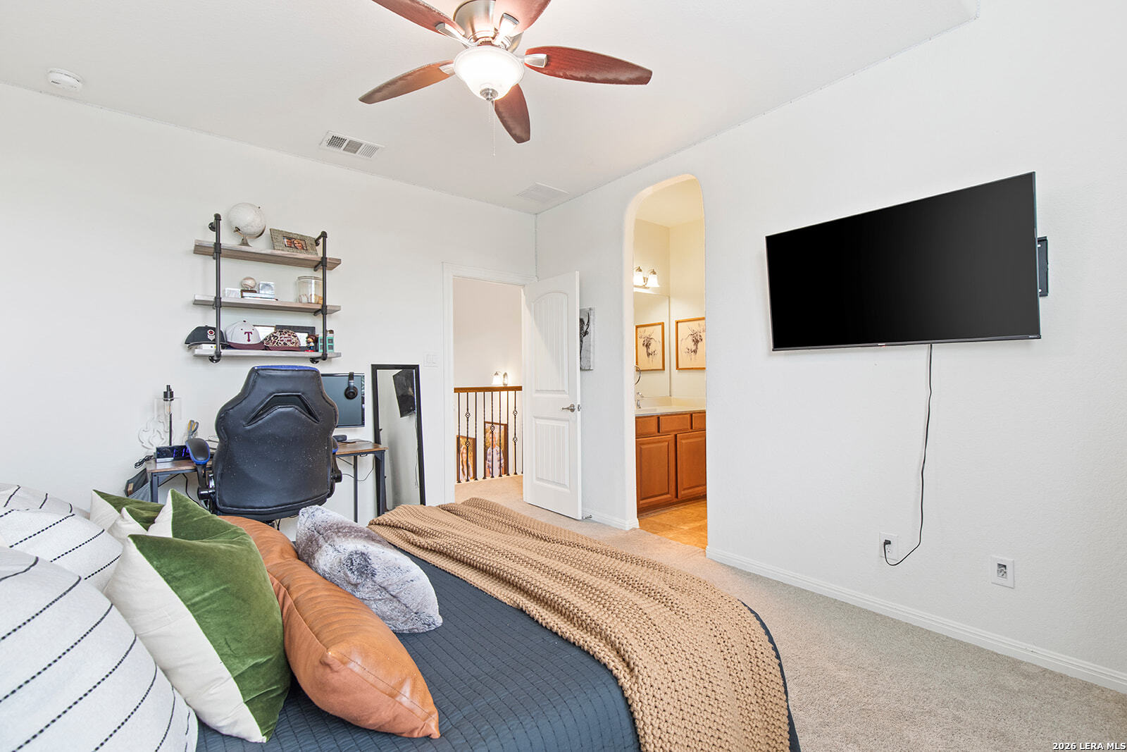 8039 Cibolo Valley Fair Oaks Ranch, TX 78015 - Photo 42 of 63 a bedroom with a bed and a flat screen tv