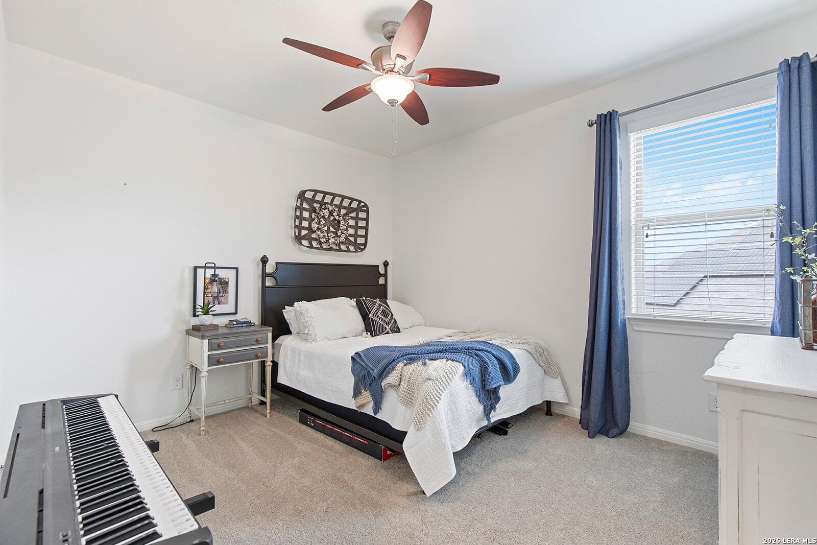 8039 Cibolo Valley Fair Oaks Ranch, TX 78015 - Photo 43 of 63 a bed room with a bed and a ceiling fan