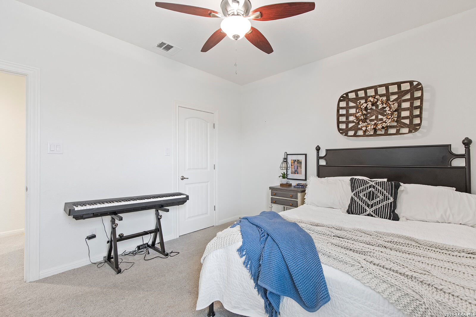 8039 Cibolo Valley Fair Oaks Ranch, TX 78015 - Photo 44 of 63 a bedroom with a bed and a window