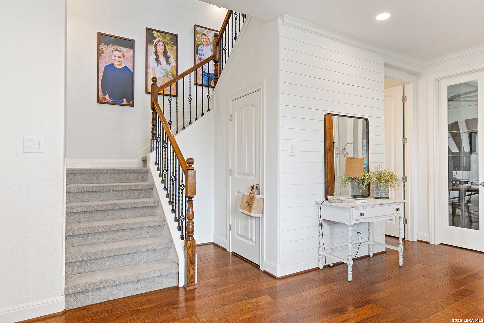 8039 Cibolo Valley Fair Oaks Ranch, TX 78015 - Photo 5 of 63 a view of a hallway with wooden floor and entryway