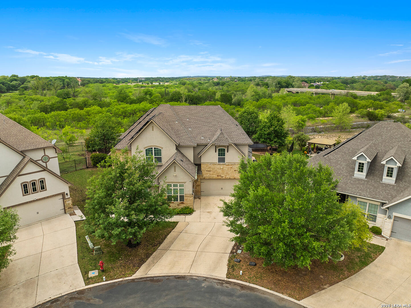 8039 Cibolo Valley Fair Oaks Ranch, TX 78015 - Photo 60 of 63 an aerial view of a house