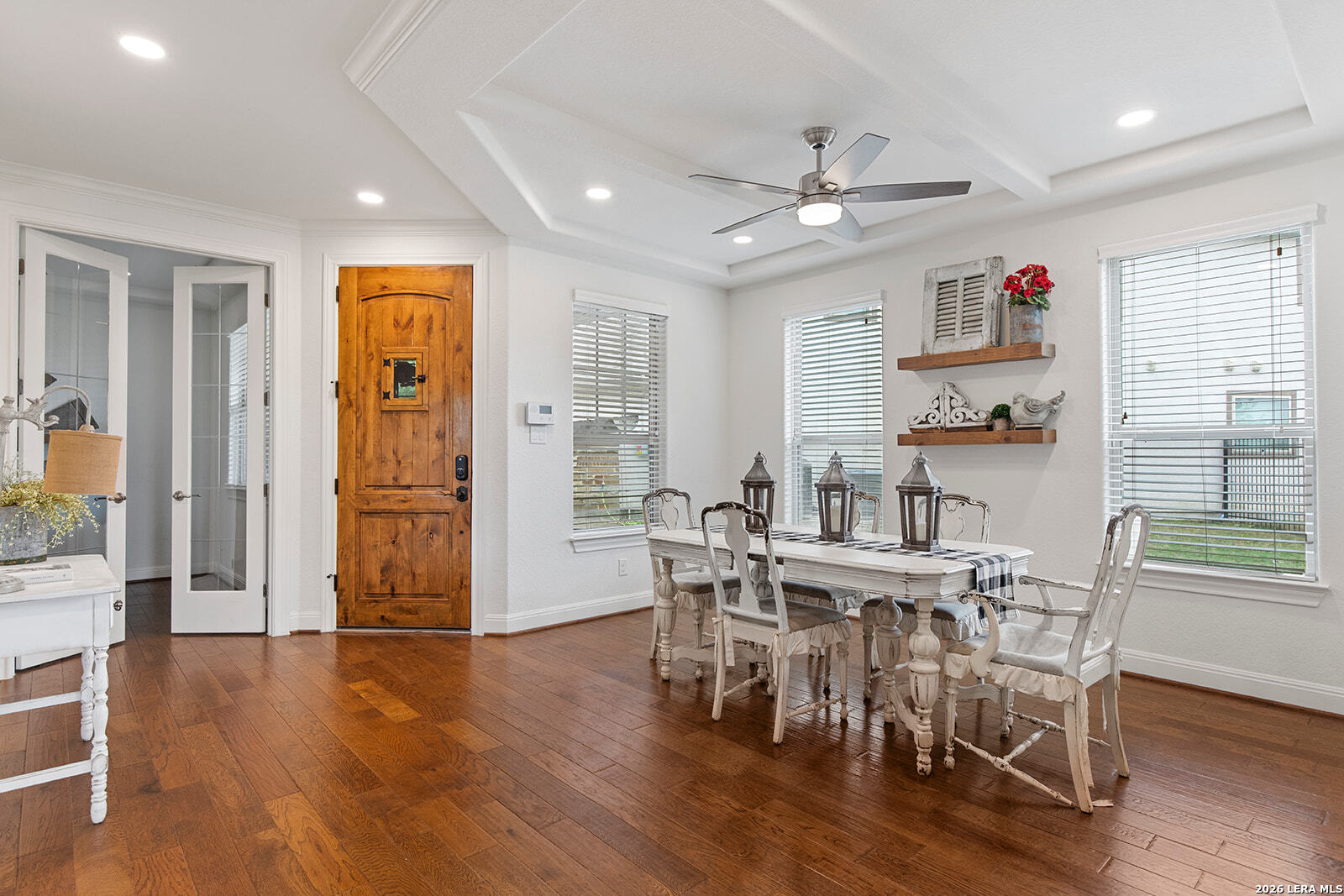 8039 Cibolo Valley Fair Oaks Ranch, TX 78015 - Photo 7 of 63 a view of a dining room with furniture and wooden floor