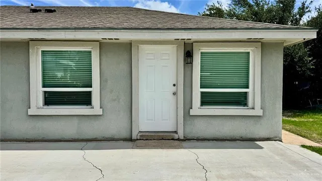 a view of a house with a outdoor space