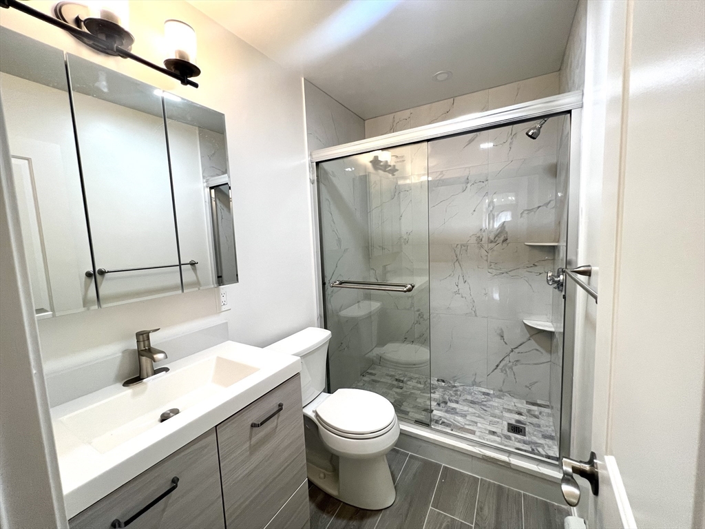 11 Jenison Street, Unit 1 Newton, MA 02460 - Photo 3 of 31