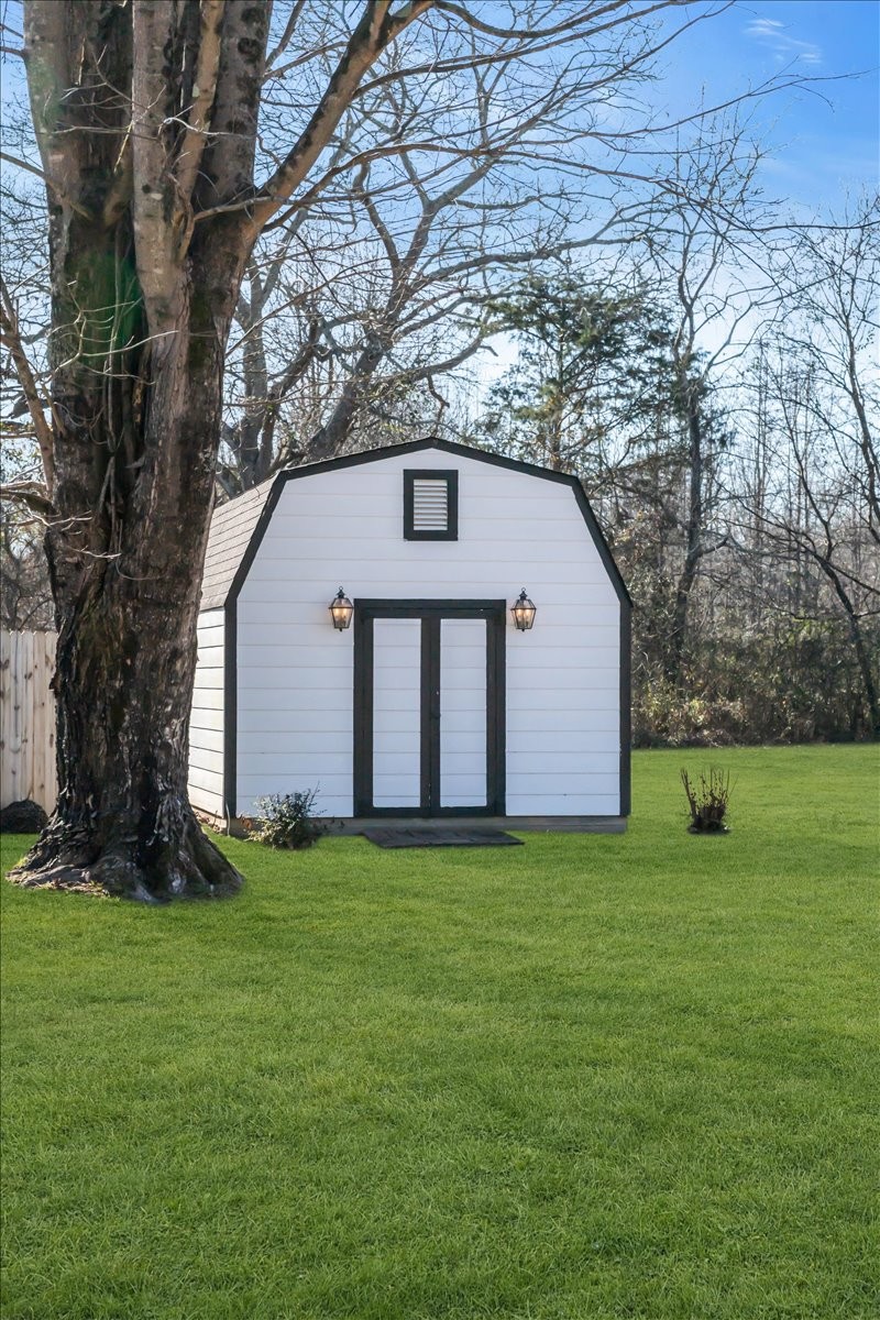 251 Miller Road Hillsboro, TN 37342 - Photo 66 of 80 a front view of a house with a yard