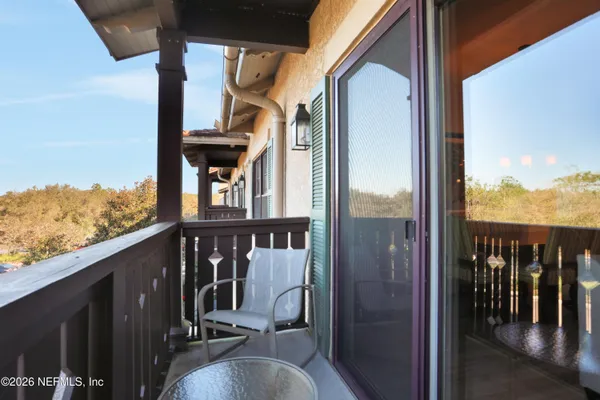 a view of a balcony with an outdoor space