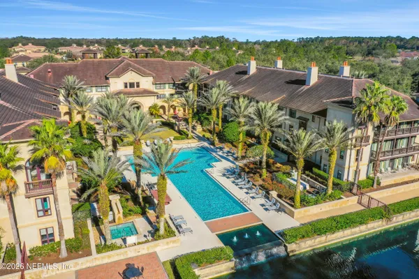 an aerial view of a house with a garden