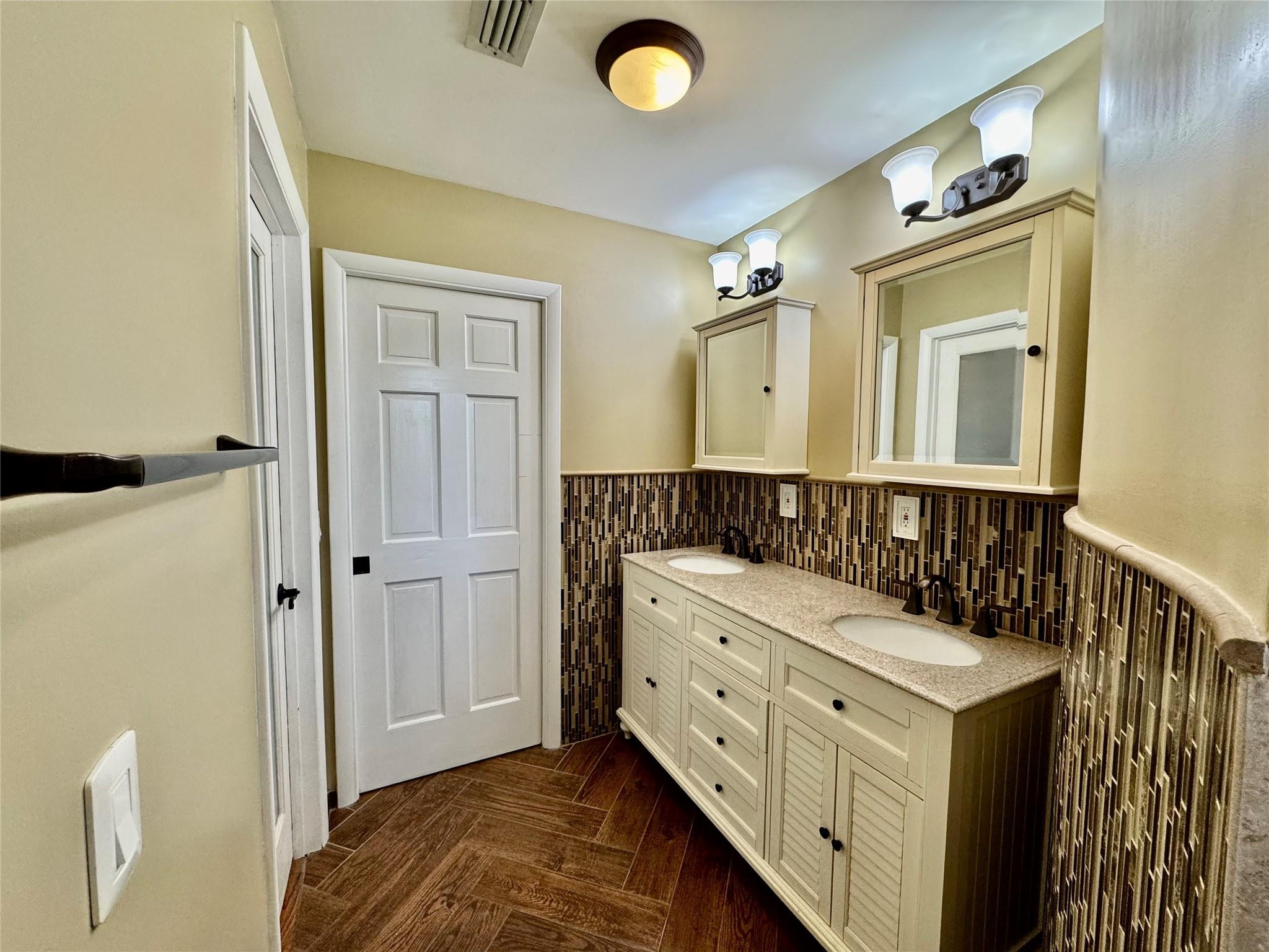 395 Southwest 30th Terrace Okeechobee, FL 34974 - Photo 20 of 57 a bathroom with a sink and a mirror