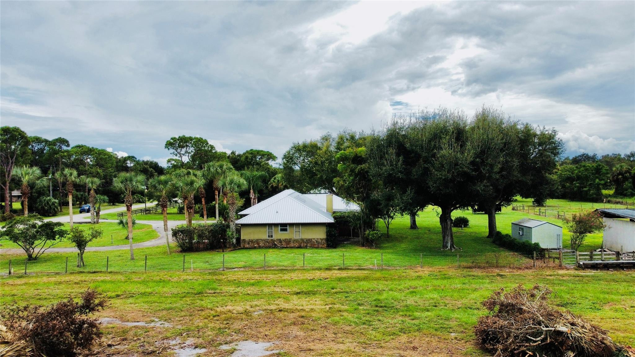 395 Southwest 30th Terrace Okeechobee, FL 34974 - Photo 55 of 57 a view of a house with a yard