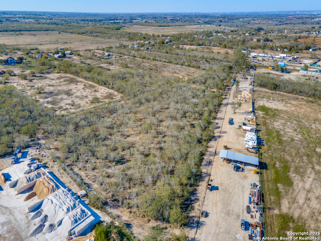 8785 West Rockport Road Von Ormy, TX 78073 - Photo 3 of 5 an aerial view of multiple house