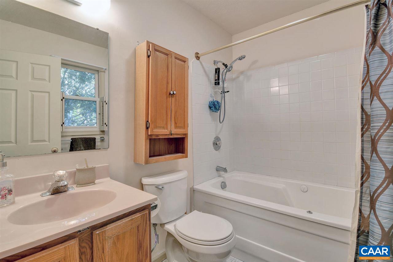 12 Laguna Road Palmyra, VA 22963 - Photo 20 of 50 a bathroom with a sink toilet and shower