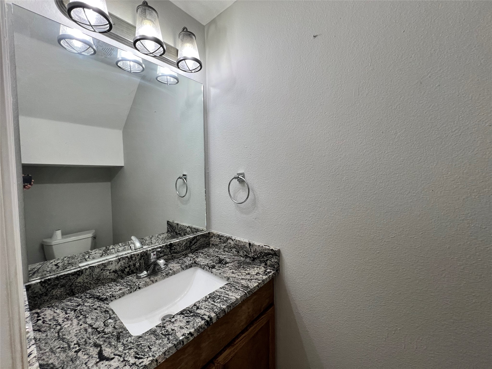 21107 Secretariat Ridge Lane Pflugerville, TX 78660 - Photo 7 of 15 Downstairs half bathroom