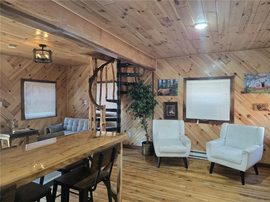 389 Winslow Hill Road Benezett, PA 15821 - Photo 5 of 33 a living room with furniture and wooden floor