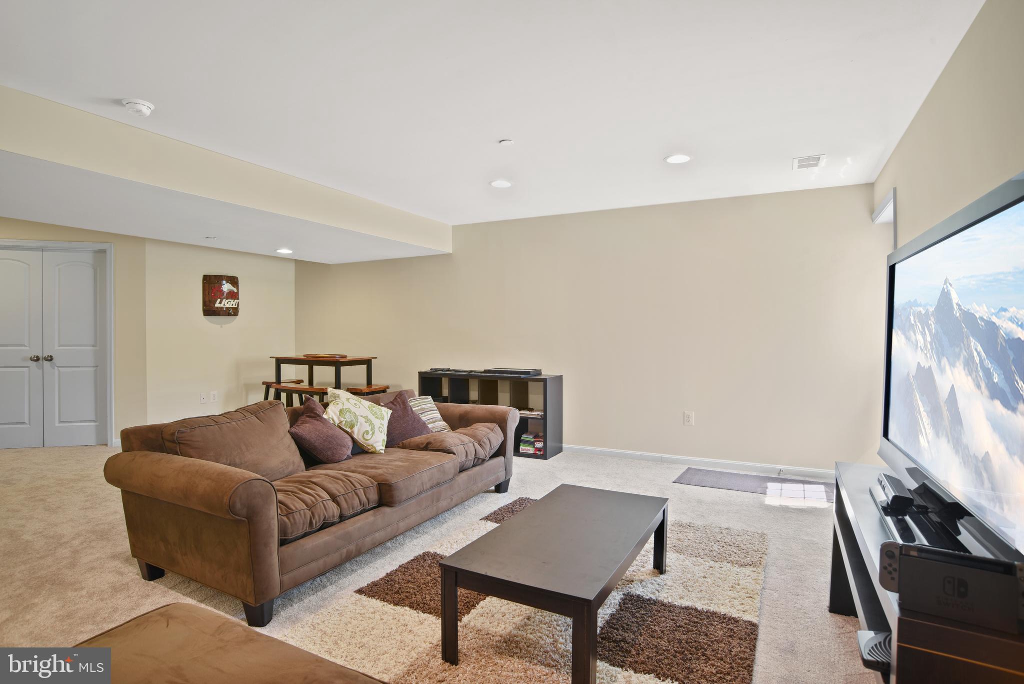 8185 Ridgely Loop Severn, MD 21144 - Photo 30 of 39 Lower Level Family room view 1