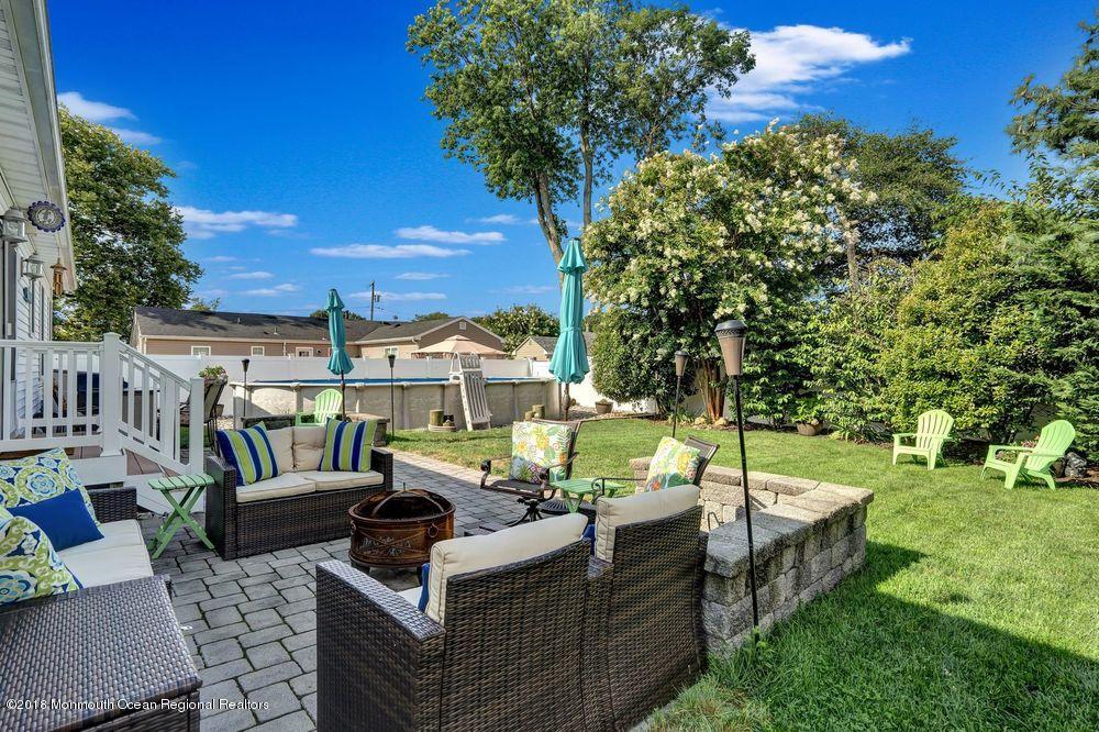 1505 Beaver Dam Road Point Pleasant, NJ 08742 - Photo 7 of 48 a view of a patio with couches and a fire pit